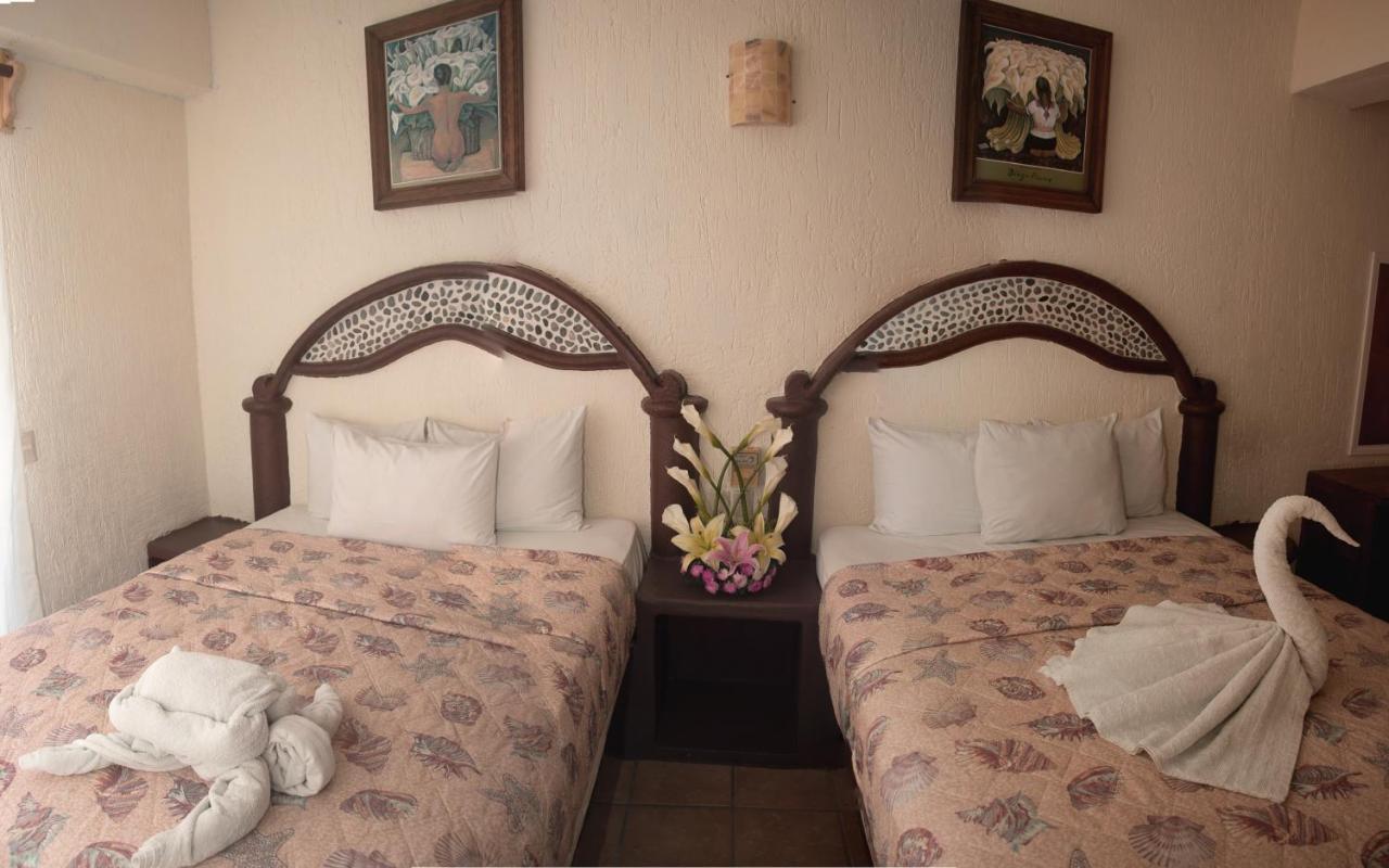 Hotel Playa Santa Cruz By Rotamundos Huatulco Exterior photo